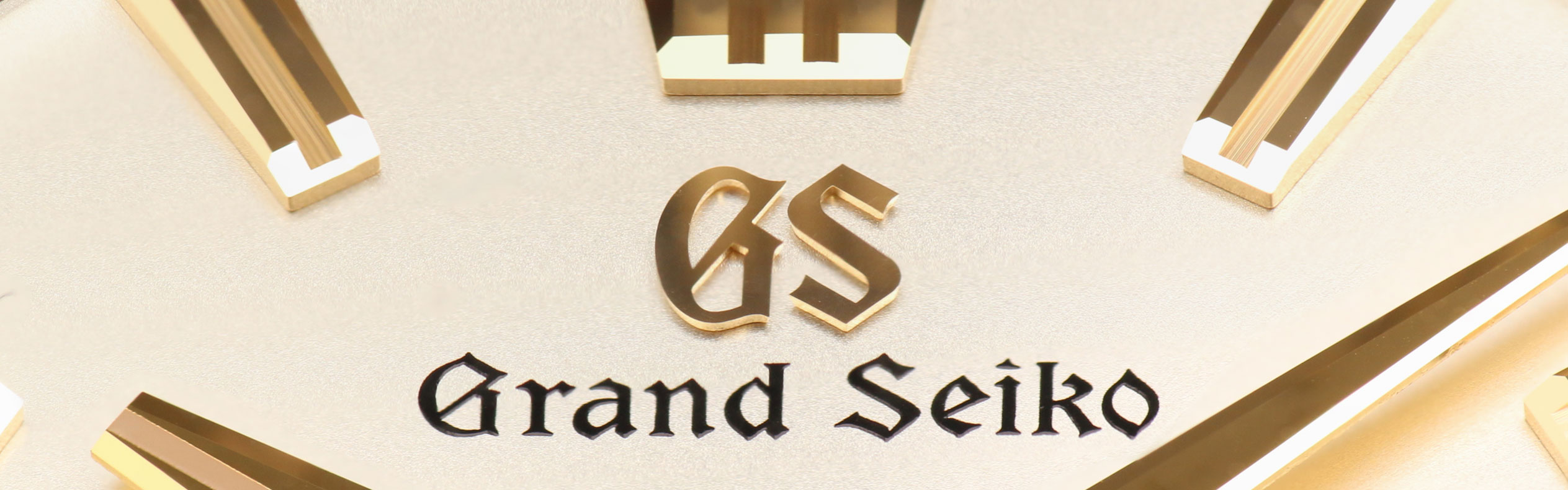 Grand Seiko SLGH002 dial detail of golden applied logo .