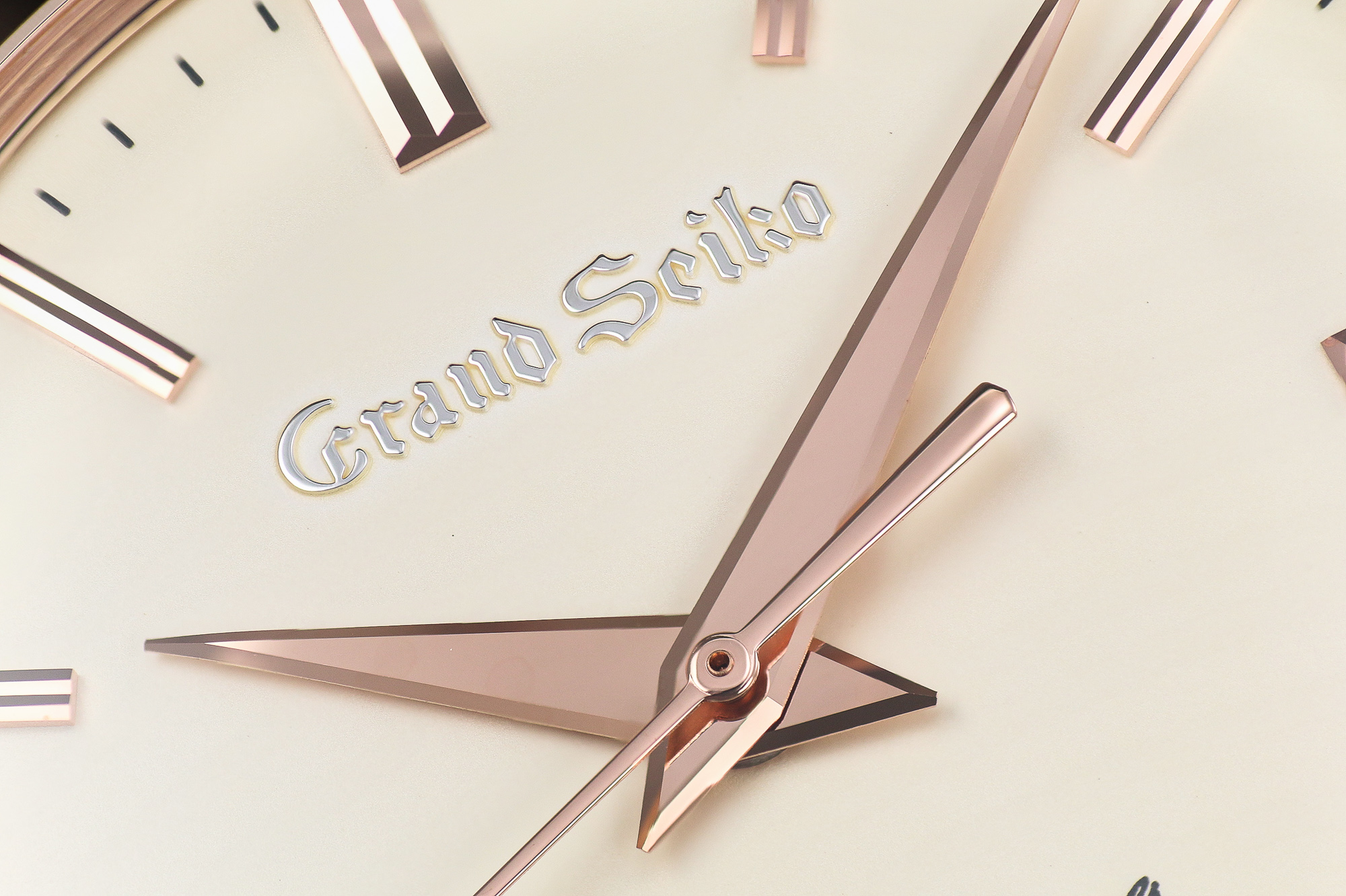 Macro of dial logo on Grand Seiko SBGW260 wristwatch.