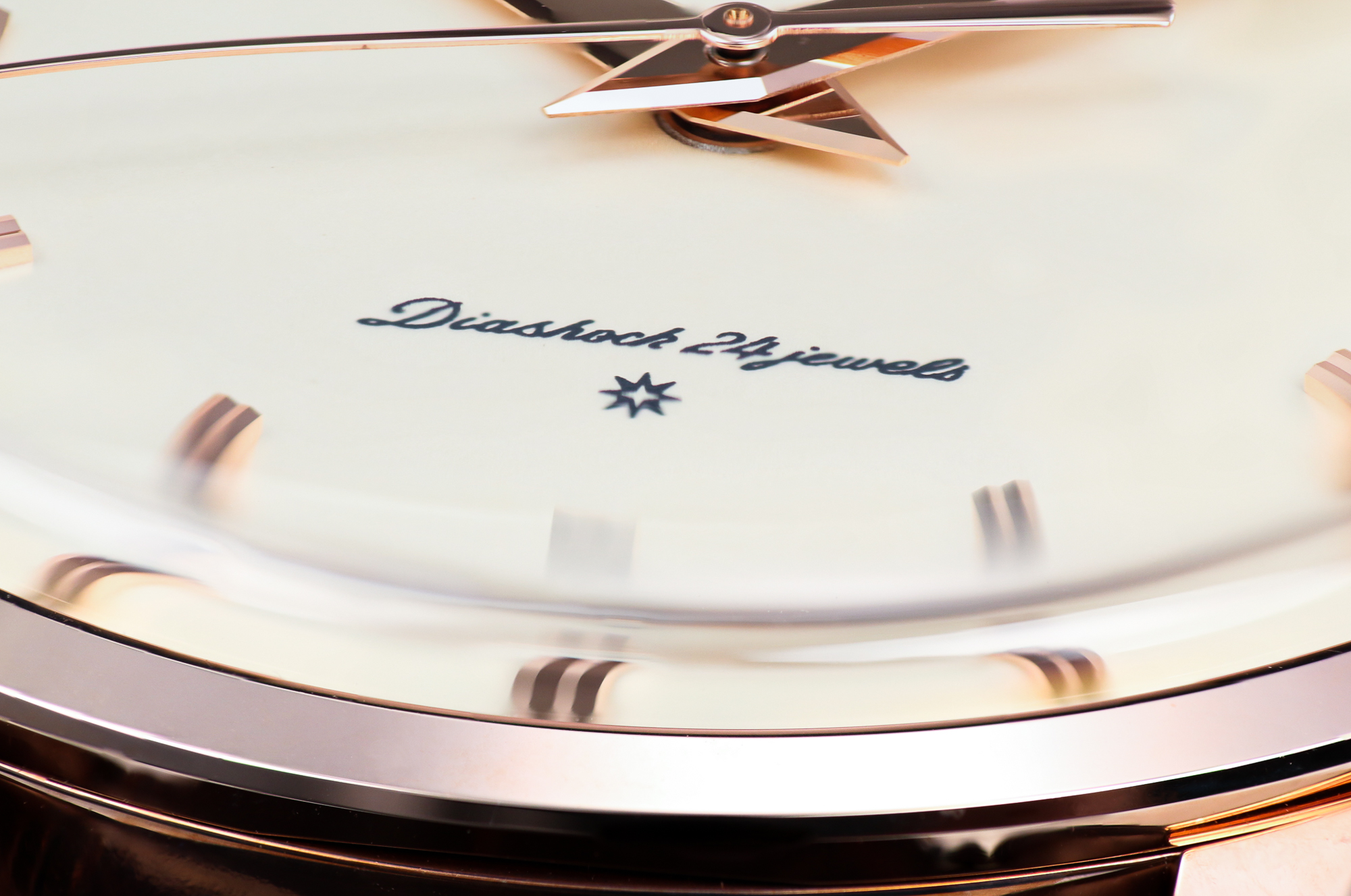 Macro of dial detail on Grand Seiko SBGW260 wristwatch.