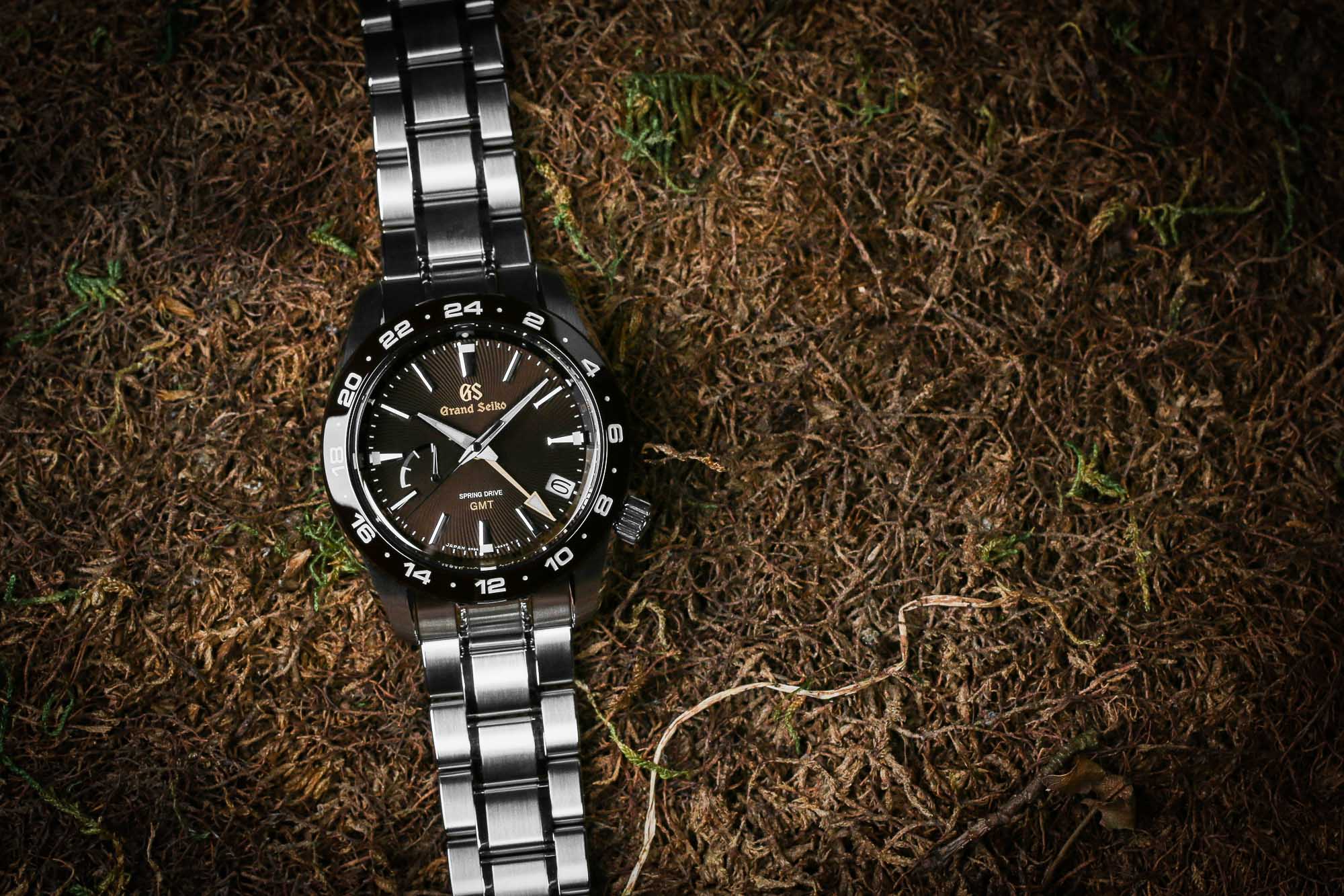Grand Seiko SBGE263, a brown-dialed wristwatch in the grass.