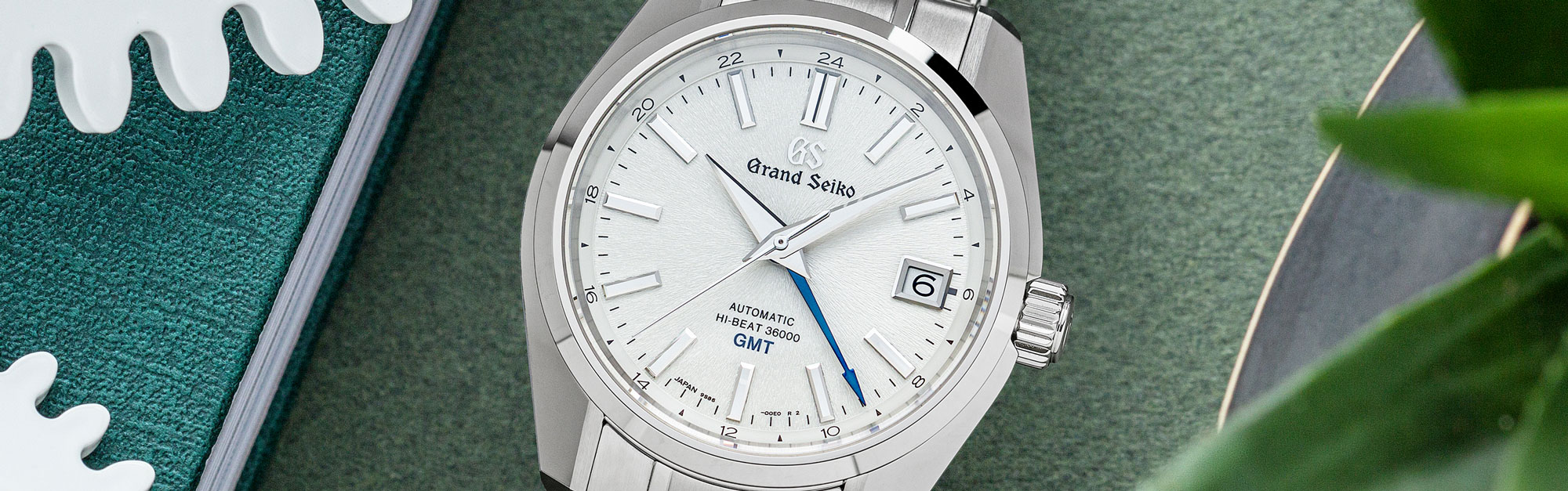 Grand Seiko SBGJ201 white dial stainless steel sport watch with GMT.
