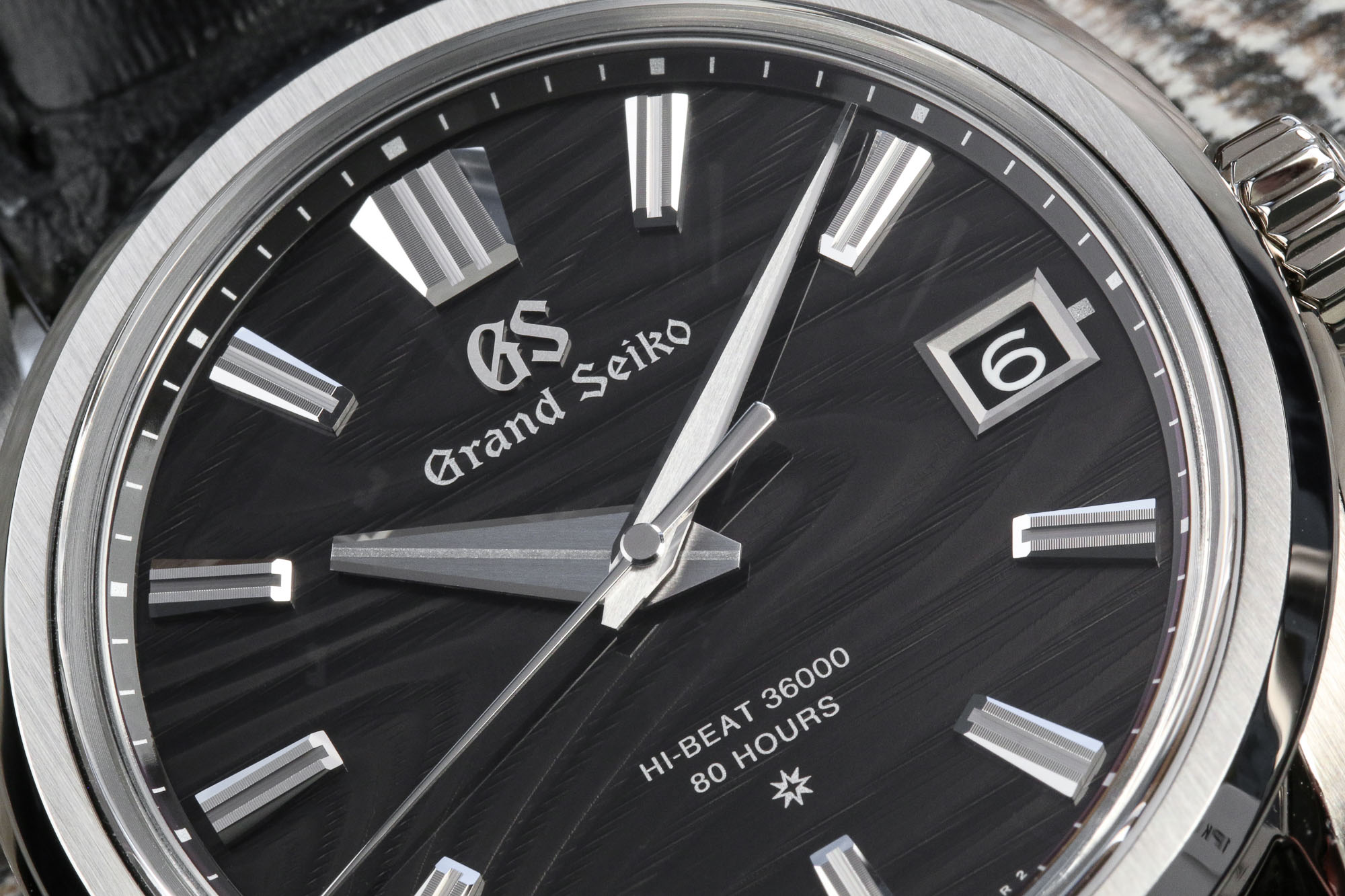 Grand Seiko SLGH007 dark dial stainless steel wristwatch.