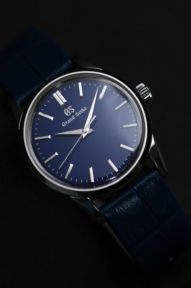 Grand Seiko SBGX349 blue dial wristwatch for men and women.