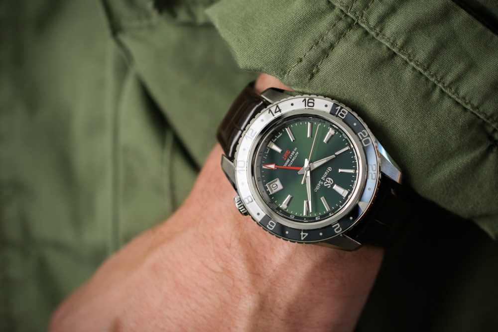 Grand Seiko SBGJ239 Hi-Beat GMT green-dial men's watches on wrist