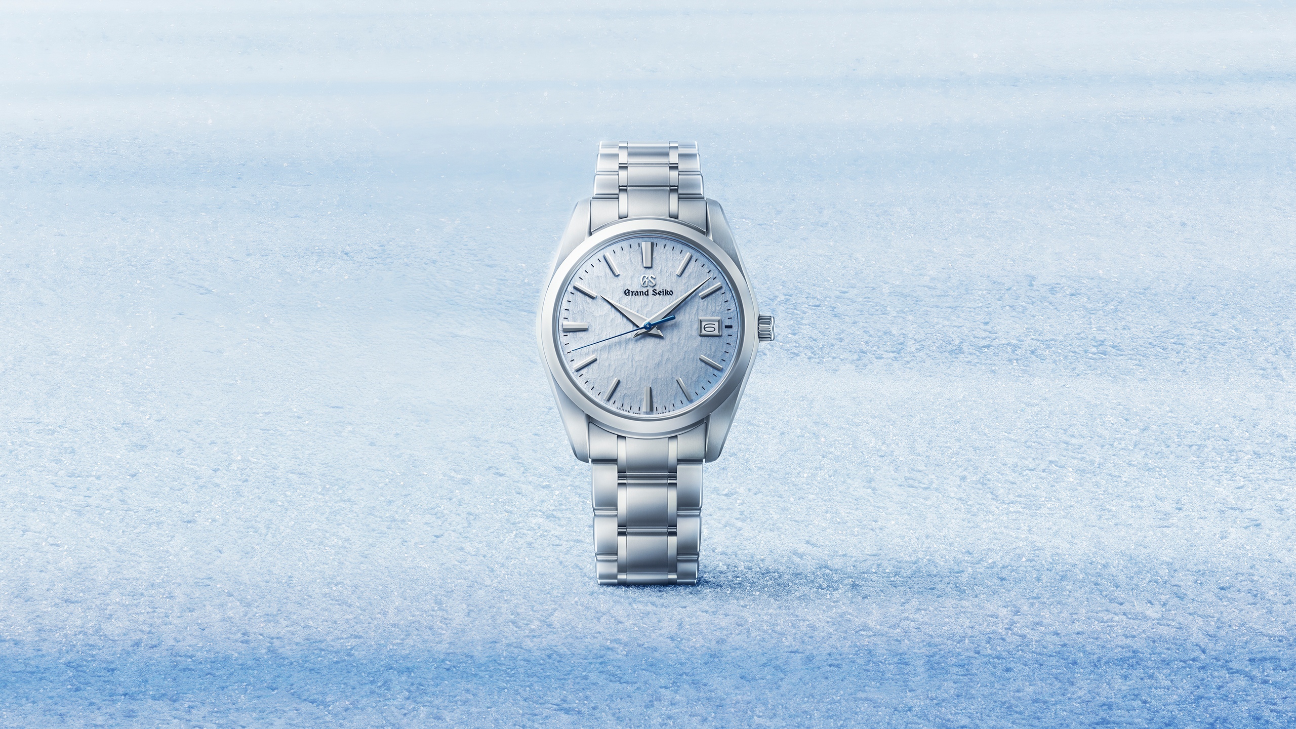 Frozen waterfall Jily Su in winter. Landscape of mountains with Grand_Seiko_Spring_Drive_GMT_SBG295-hero-thumbnail